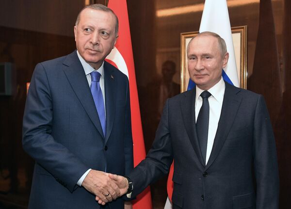 Президент РФ Владимир Путин и президент Турции Реджеп Тайип Эрдоган на Международной конференции по Ливии в Берлине Президент РФ Владимир Путин и президент Турции Реджеп Тайип Эрдоган на Международной конференции по Ливии в Берлине