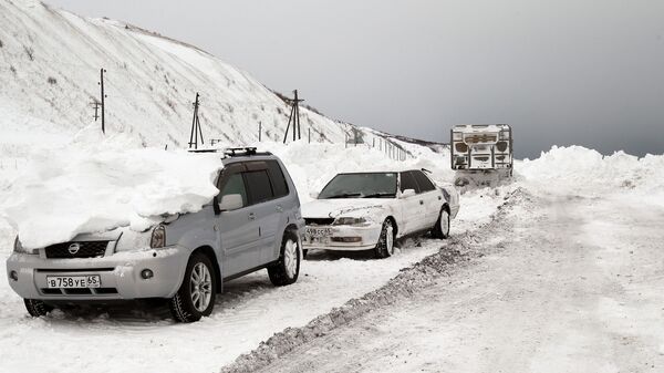 Расчистка автодорог на Сахалине. Архив Расчистка автодорог на Сахалине. Архив