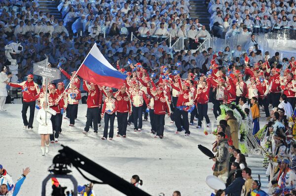 Спортсмены сборной России на церемонии торжественного открытия XXI зимних Олимпийских игр. Архив Спортсмены сборной России на церемонии торжественного открытия XXI зимних Олимпийских игр. Архив