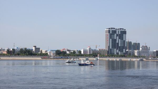Вид на Хэйхэ (КНР) с российского берега (Благовещенск). Архивное фото Вид на Хэйхэ (КНР) с российского берега (Благовещенск). Архивное фото
