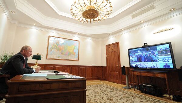 Премьер-министр РФ В.Путин провел видеоконференцию по вопросам дорожного строительства Премьер-министр РФ В.Путин провел видеоконференцию по вопросам дорожного строительства