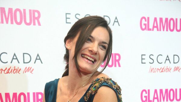 Елена Исинбаева на церемонии вручения премии Женщина года журнала Glamour Елена Исинбаева на церемонии вручения премии Женщина года журнала Glamour