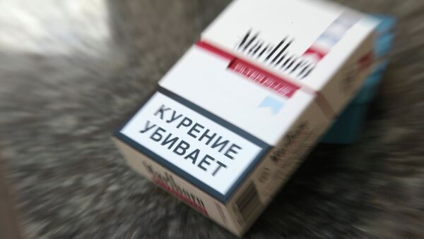 Пачка сигарет с предупреждающей о вреде курения надписью Пачка сигарет с предупреждающей о вреде курения надписью