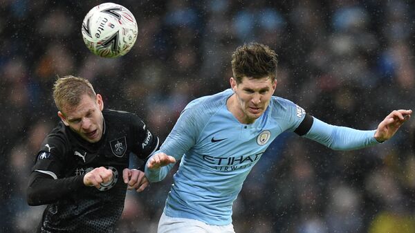 Burnley's Czech striker Matej Vydra (L) battles with Manchester City's English defender John Stones (R) during the English FA Cup fourth round football match between Manchester City and Burnley at the Etihad Stadium in Manchester, north west England, on January 26, 2019. (Photo by Oli SCARFF / AFP) / RESTRICTED TO EDITORIAL USE. No use with unauthorized audio, video, data, fixture lists, club/league logos or 'live' services. Online in-match use limited to 120 images. An additional 40 images may be used in extra time. No video emulation. Social media in-match use limited to 120 images. An additional 40 images may be used in extra time. No use in betting publications, games or single club/league/player publications. / Burnley's Czech striker Matej Vydra (L) battles with Manchester City's English defender John Stones (R) during the English FA Cup fourth round football match between Manchester City and Burnley at the Etihad Stadium in Manchester, north west England, on January 26, 2019. (Photo by Oli SCARFF / AFP) / RESTRICTED TO EDITORIAL USE. No use with unauthorized audio, video, data, fixture lists, club/league logos or 'live' services. Online in-match use limited to 120 images. An additional 40 images may be used in extra time. No video emulation. Social media in-match use limited to 120 images. An additional 40 images may be used in extra time. No use in betting publications, games or single club/league/player publications. /
