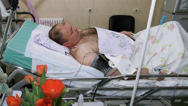 Майор полиции Юрий Седых, раненый при задержании подозреваемого в убийстве шести человек С.Помазуна Майор полиции Юрий Седых, раненый при задержании подозреваемого в убийстве шести человек С.Помазуна