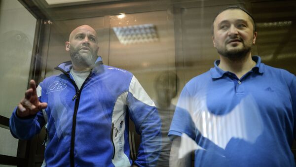 Фигуранты дела Политковской, Сергей Хаджикурбанов (слева) и Рустам Махмудов. Архивное фото Фигуранты дела Политковской, Сергей Хаджикурбанов (слева) и Рустам Махмудов. Архивное фото