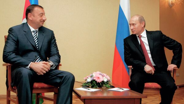 Президент Азербайджана Ильхам Алиев и президент России Владимир Путин во время встречи в государственной резиденции «Алмалы», 2006 Президент Азербайджана Ильхам Алиев и президент России Владимир Путин во время встречи в государственной резиденции «Алмалы», 2006