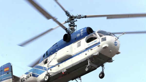 Вертолет Ка-32, предназначенный для тушения пожаров. Архивное фото Вертолет Ка-32, предназначенный для тушения пожаров. Архивное фото