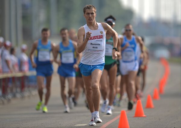 Российский спортсмен Андрей Рузавин в финальных соревнованиях по спортивной ходьбе на дистанции 20 км среди мужчин Российский спортсмен Андрей Рузавин в финальных соревнованиях по спортивной ходьбе на дистанции 20 км среди мужчин