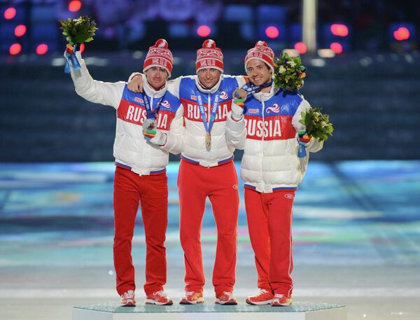Максим Вылегжанин (Россия) - серебряная медаль, Александр Легков (Россия) - золотая медаль, Илья Черноусов (Россия) - бронзовая медаль Максим Вылегжанин (Россия) - серебряная медаль, Александр Легков (Россия) - золотая медаль, Илья Черноусов (Россия) - бронзовая медаль